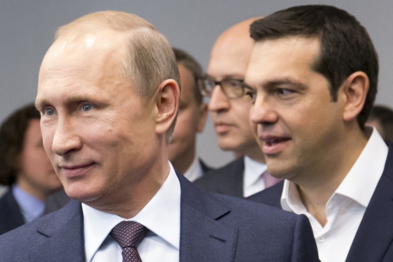 Russian President Vladimir Putin and Greek Prime Minister Alexis Tsipras arrive for their talks at the St. Petersburg International Investment Forum in St. Petersburg, Russia [AP]