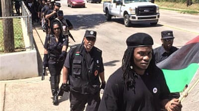  HPNGC  organises armed marches and patrols throughout black neighbourhoods [Creede Newton/Al Jazeera]