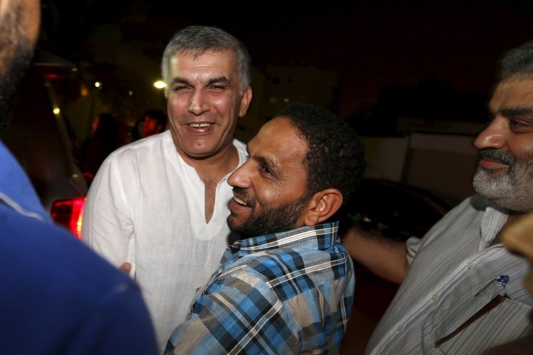 Bahraini human rights activist Nabeel Rajab is greeted by friends upon his arrival to his home after being pardoned by Bahrain''s King Hamad, in the village of Bani Jamra, west of Manama
