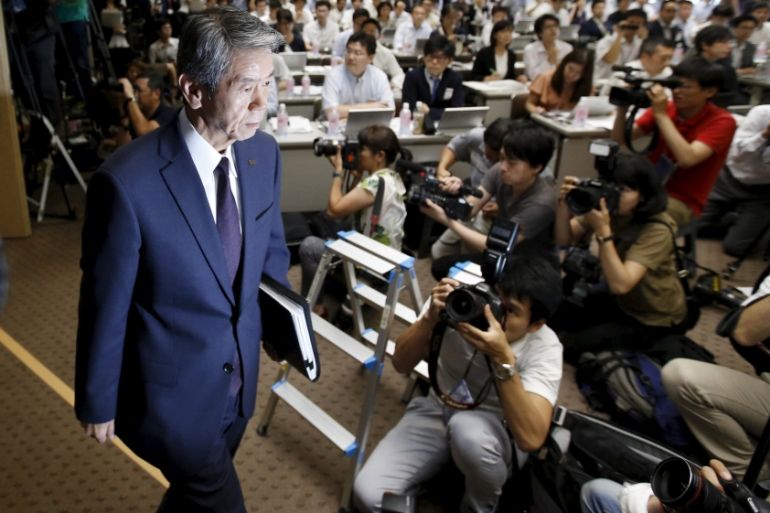 Toshiba Corp President and Chief Executive Officer Hisao Tanaka arrives for a news conference at the company headquarters in Tokyo