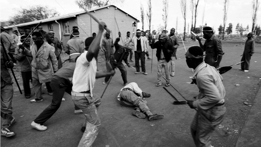 In August 1990, I captured the killing of a suspected ANC supporter by Zulu supporters of the Inkatha Freedom Party in Nancefield hostel in Soweto following a street conflict with ANC supporters [Greg Marinovich]