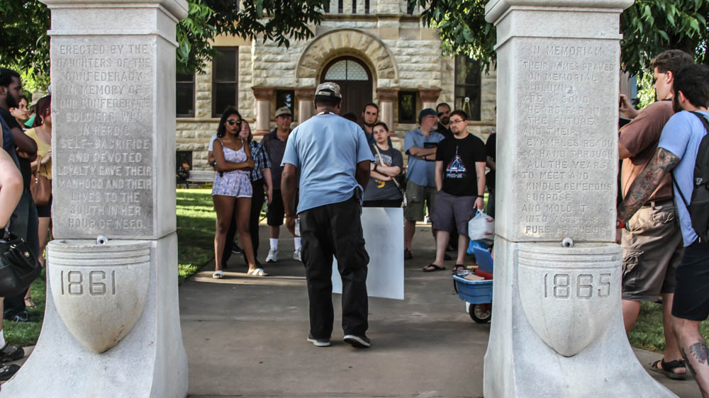 For Hudspeth and like-minded Dentonites, the two drinking fountains at the foot of the memorial symbolise racial segregation and intolerance [Shaghayegh Tajvidi/Al Jazeera]