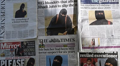 An arrangement of British daily newspapers photographed in February 2015 shows the ISIL militant dubbed 'Jihadi John'. [Getty]