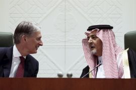 Saudi Foreign Minister, Prince Saud al-Faisal and British Foreign Secretary Philip Hammond talk during a news conference in Riyadh