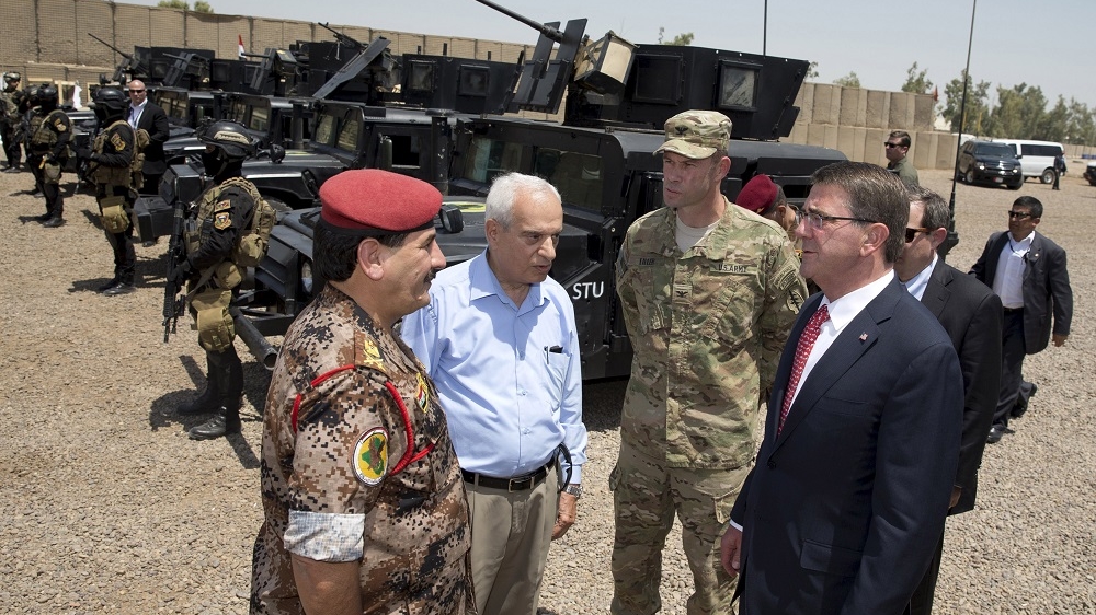 US Defense Secretary Ashton Carter visits a training exercise in Baghdad [Reuters]