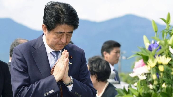 Japan''s Prime Minister Shinzo Abe and his wife Akie pay respects to a grave of his father and former Foreign Minister Shintaro Abe in Nagato, western