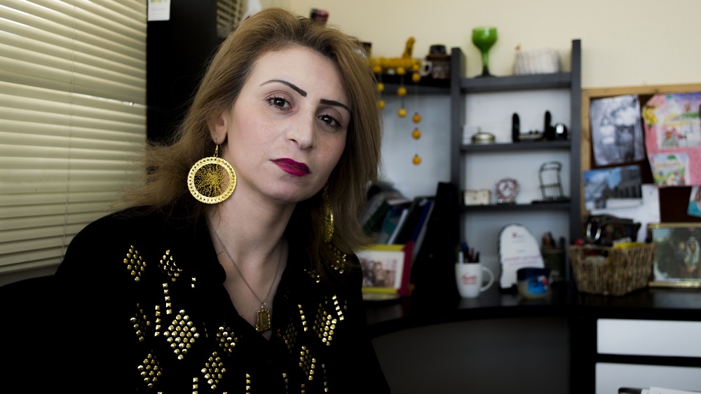 The general director of ADWAR, Sahar al-Kawasmeh, says her organisation can eventually help raise funds for the all-female taxi company [Abed al-Qaisi/Al Jazeera] 