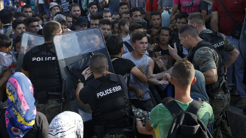 The flow into Macedonia had reached 1,500-2,000 people per day in recent weeks [AP]