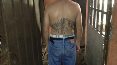 18th Street Gang leader 'Santiago' [Matt Chandler/Al Jazeera]