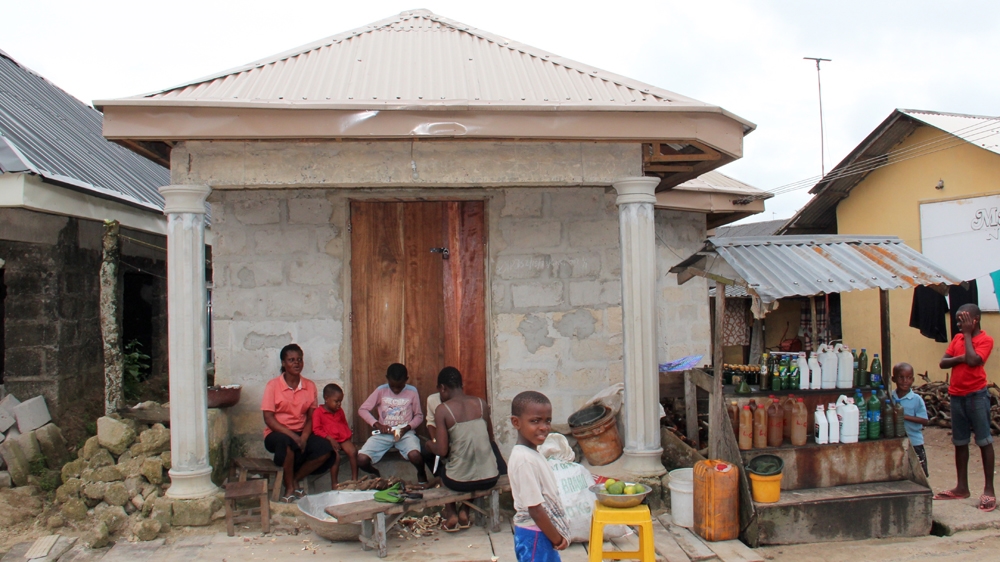 The new concrete house sits on the same spot where the family's old mud home used to be [Femke van Zeijl/Al Jazeera]
