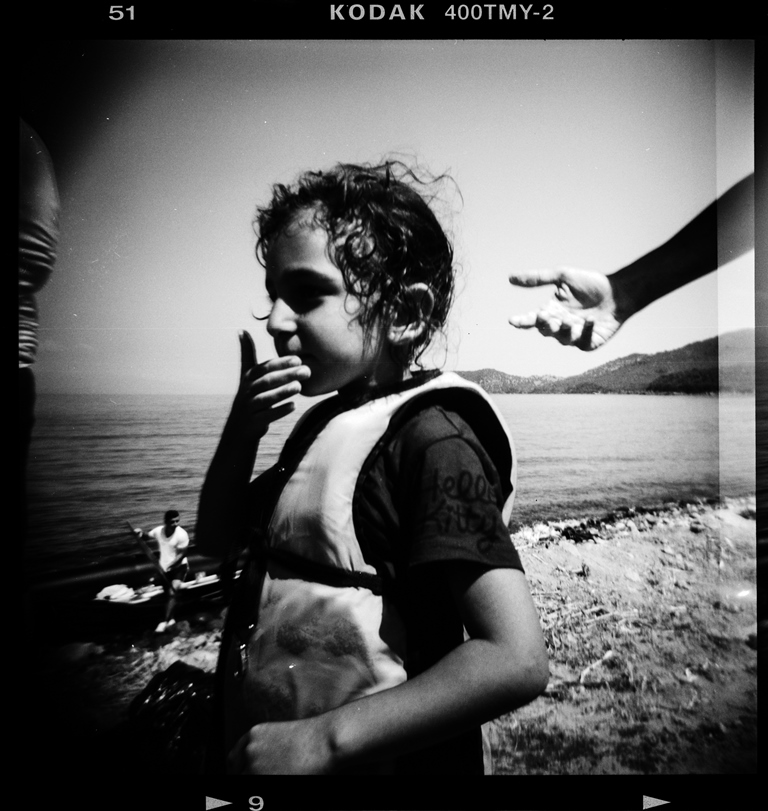 A Syrian child moments after his arrival in a dinghy on Psalidi beach on the Greek island of Kos – Kos, Greece, August 2015 [Giorgos Moutafis] 