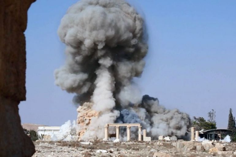 smoke from the detonation of the 2,000-year-old temple of Baalshamin in Syria''s ancient caravan city of Palmyra