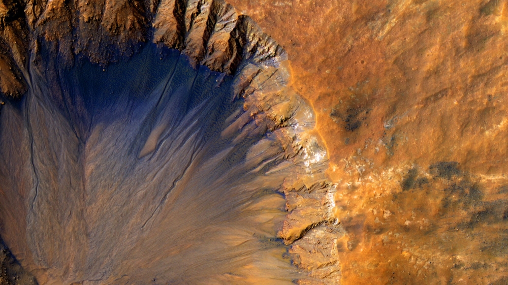 Crater in the Sirenum Fossae region of Mars [EPA/NASA/JPL/University of Arizona] 