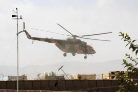 An Afghan helicopter carries Afghan special forces as they arrive for a battle with the Taliban in Kunduz city, northern Afghanistan