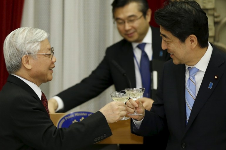 Vietnam''s Communist Party''s General Secretary Nguyen Phu Trong makes a toast with Japan''s PM Abe during a welcome dinner hosted by Abe at his official residence in Tokyo