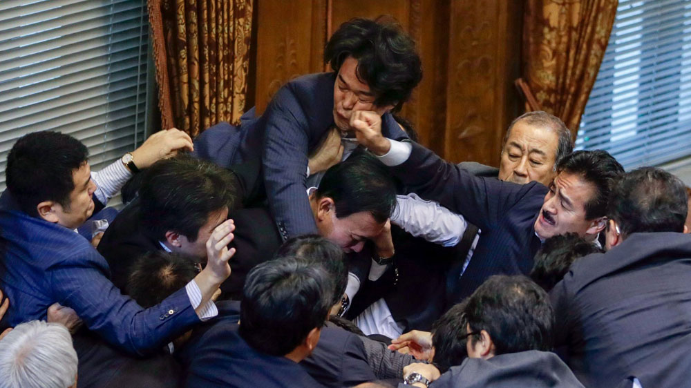 Major scuffles have broken out between parliament members over the security bills [EPA]