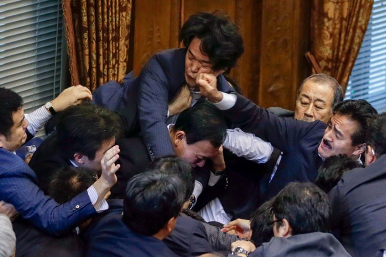 Japan parliament brawl over security bill