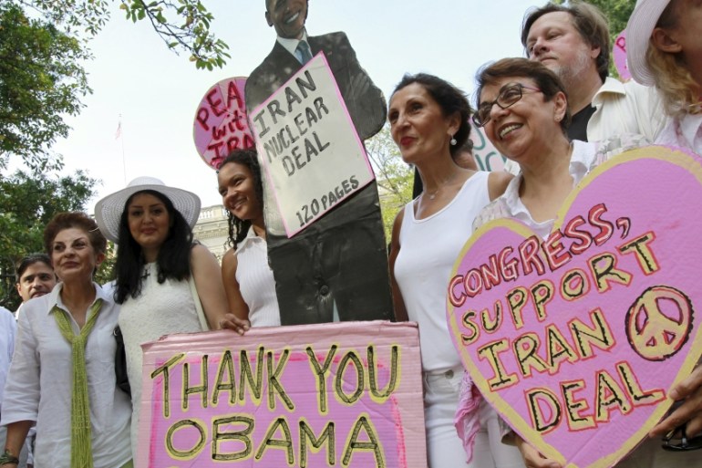 Anti-war activists rally outside the White House in Washington in support of the Iran nuclear deal