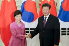 Chinese President Xi Jinping shakes hands with South Korean President Park Geun-hye at The Great Hall Of The People in Beijing, China [REUTERS]