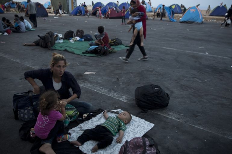 A Syrian child sleep at the port of the island of Lesbos