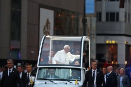 Pope Francis waves to crowds outside of St. Patrick''s Cathedral in New York