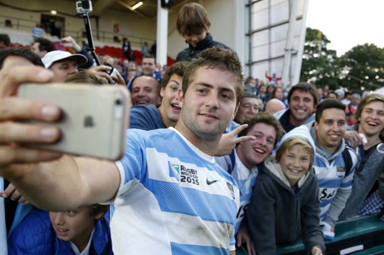 Argentina''s Santiago Cordero celebrates with fans at the end of the Rugby World Cup match