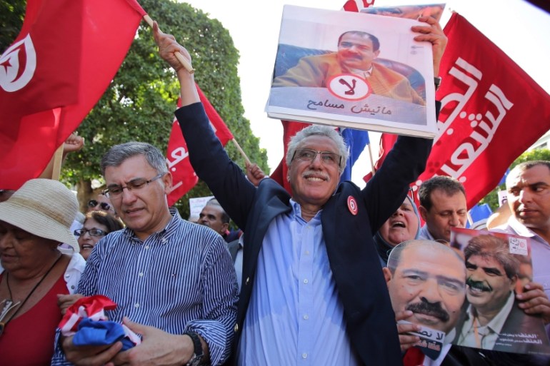 Tunisian opposition demonstrates economic reconciliation law