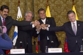 Venezuelan President Nicolas Maduro, Uruguayan President Tabare Ramon Vazquez, Ecuador''s President Rafael Correa and Colombian President Juan Manuel Santos, join hands