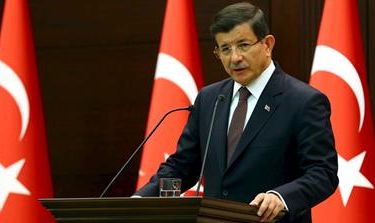 Handout photo of Turkish Prime Minister Davutoglu speaking during a press conference in Ankara