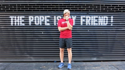 Graffiti in Manhattan declares 'The pope is my friend' [James Reinl/Al Jazeera]
