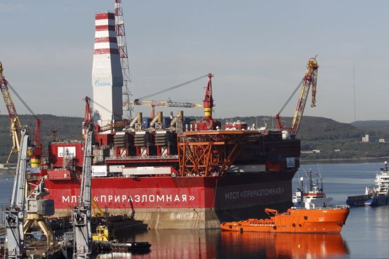 The Prirazlomnaya platform is towed from Murmansk to an oilfield in the Pechora Sea, northern Russia. Russia says it has submitted its bid for vast territories in the Arctic to the United Nations [AP]