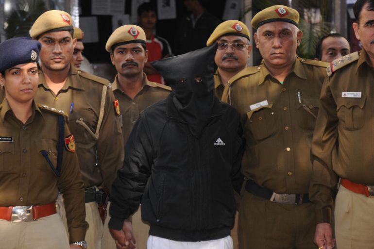 Uber taxi driver accused of raping is taken to a court in New Delhi