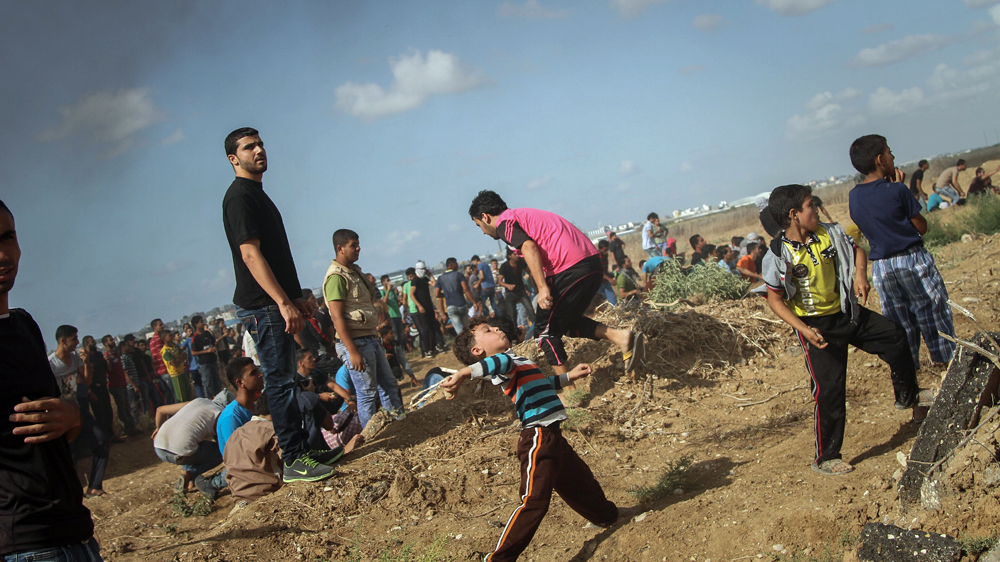 The violence spread to Gaza on Friday when several Palestinians were killed during clashes [Ezz Zanoun/Al Jazeera]