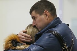 Relatives react after a Russian airliner crashes