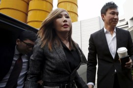 City Harvest Church founder Kong Hee and his wife Sun Ho, also known as Ho Yeow Sun, arrive at the State Courts in Singapore