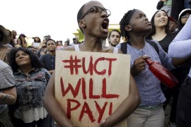 Students protest during a mass demonstration on the steps of Jameson Hall at the University of Cape Town