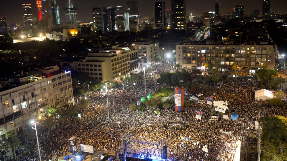 Tens of thousands gathered at Tel Aviv's Rabin Square on Saturday night [AP]