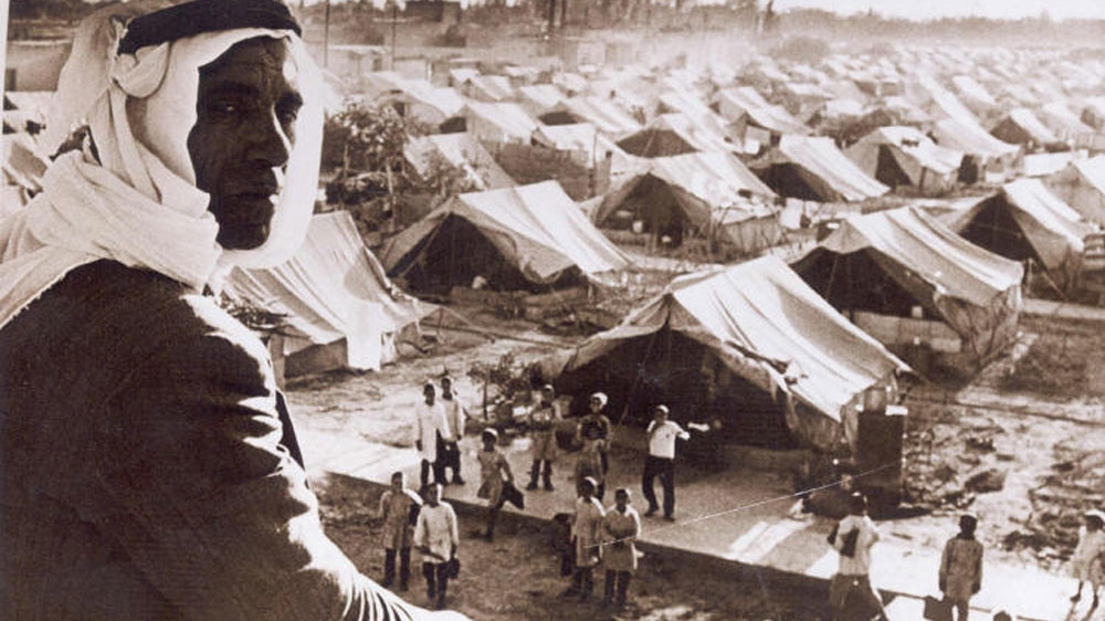 A Palestinian man sits in a refugee camp following the displacement in Nakba [palestineremembered.com/Flickr]