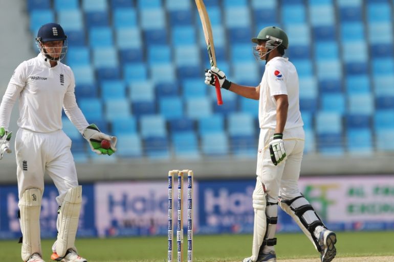 Pakistan''s Younis Khan celebrates scoring a half century