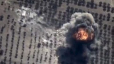 An explosion after Russian air strikes on an ISIL fuel depot in Idlib [Reuters]