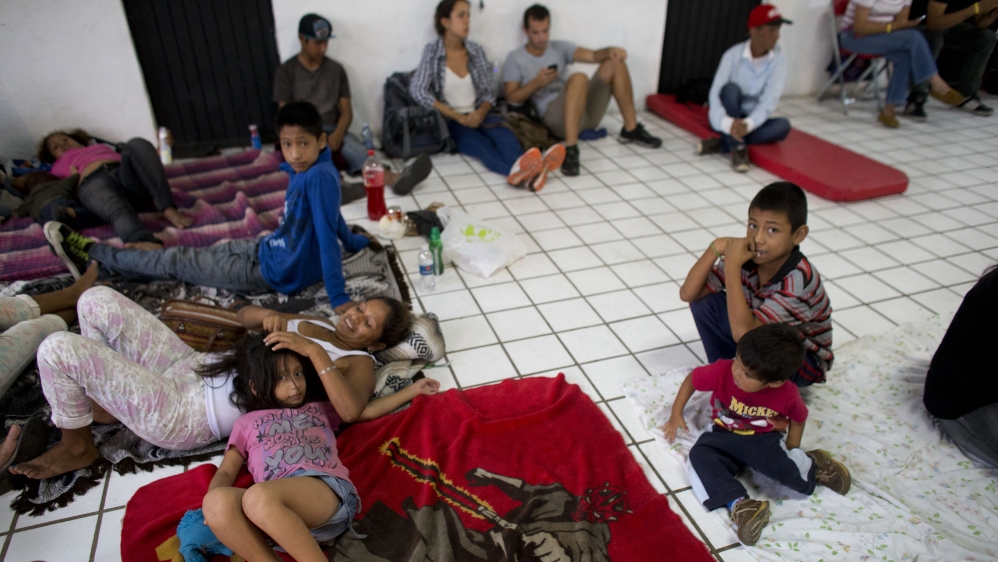 Thousands of residents and tourists have been evacuated into shelters from affected areas along Mexico's coast [AP]