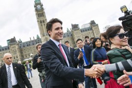 Canadian Prime Minister designate Justin Trudeau greets people as he leaves Parliament Hill for a press conference in Ottawa, Canada [EPA]