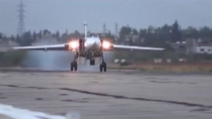 Frame grab taken from Russia''s Defence Ministry footage shows Russian military jet landing on tarmac at Hmeymim air base near Latakia, Syria