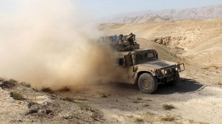 An Afghan security vehicle advances towards Kunduz, Afghanistan