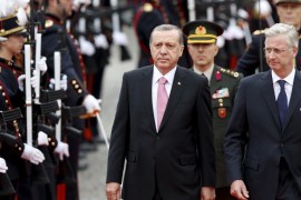 Belgium''s King Philippe and Turkey''s President Erdogan review an honour guard during a welcome ceremony outside the Royal Palace in Brussels