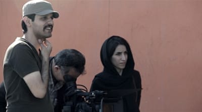 Film-maker Keywan Karimi on a scene of a movie called 'Writing on the City' in Tehran [AP]