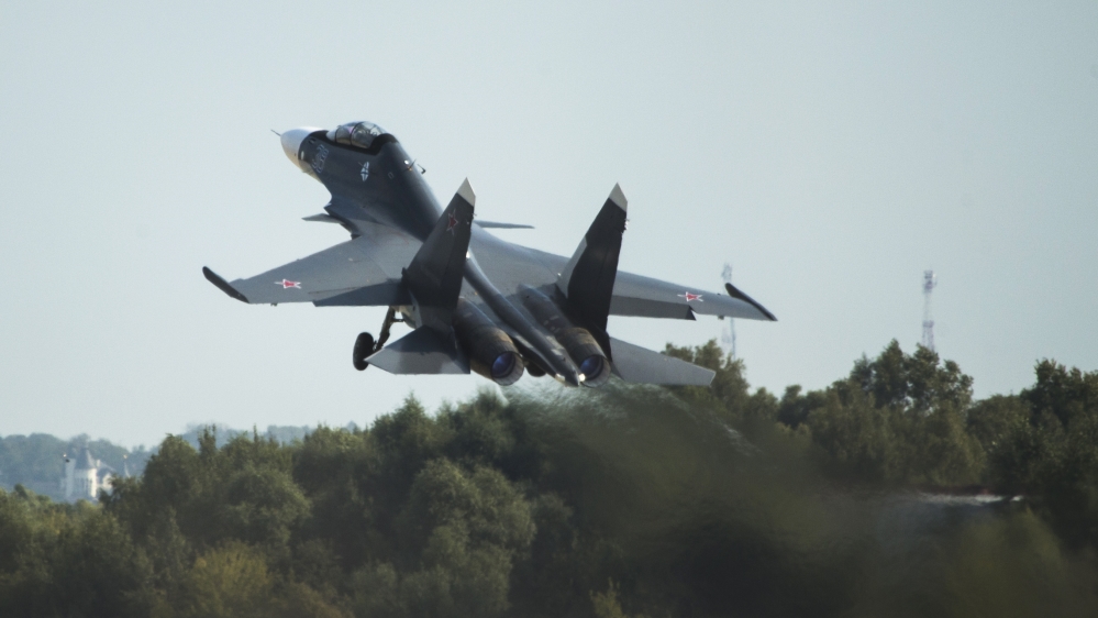 The use of advanced air-to-air fighter jets, such as the Su-30, suggest Moscow is letting NATO know of its military might [File:AP]