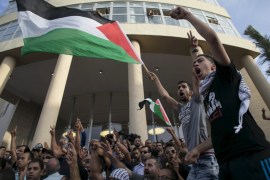 Israeli Arabs take part in a a pro-Palestinian rally in the northern Israeli town of Sakhnin