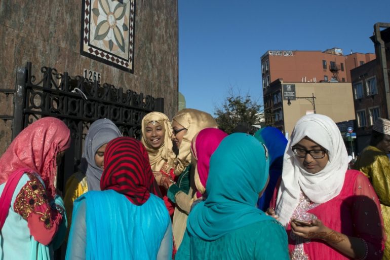 Young women and girls are seen after Eid Al-Adha prayers outside the Masjid At-Taqwa mosque in New York [REUTERS]