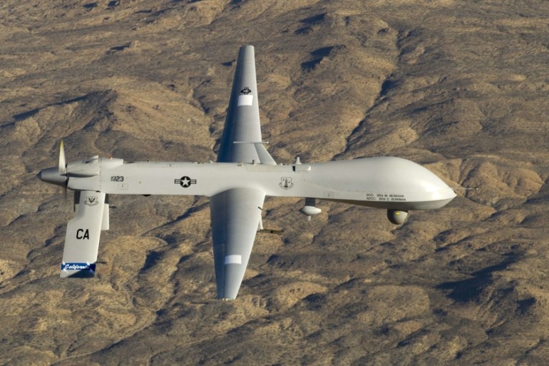 A U.S. Air Force MQ-1 Predator unmanned aerial vehicle flies near the Southern California Logistics Airport in Victorville, California in USAF handout photograph